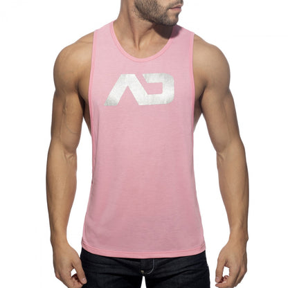 Pink sleeveless tank top featuring a silver metallic ad logo on the chest from ad logo low rider collection
