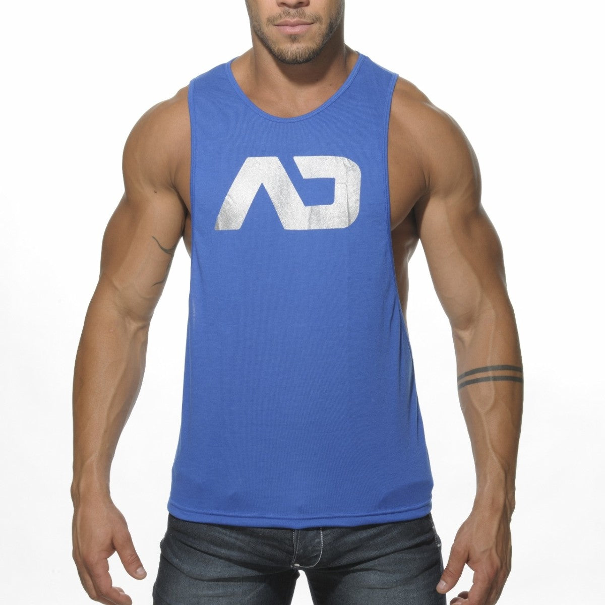 Blue sleeveless athletic tank top with white distressed ad logo on chest designed for low rider workouts