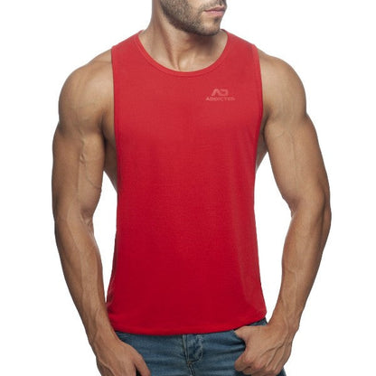 Red sleeveless tank top ad low rider with a subtle logo on the chest perfect for casual wear