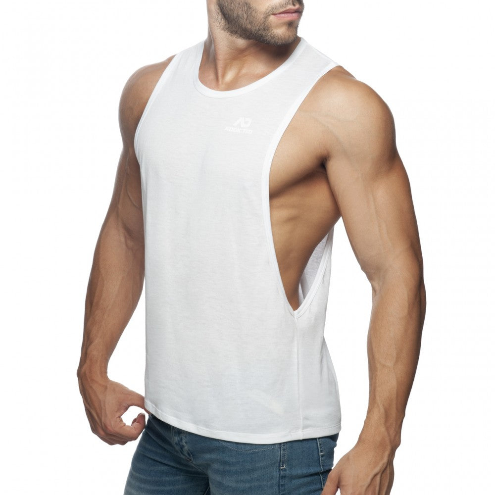 White muscle tank top ad low rider with distinctive side cutout designed for casual wear
