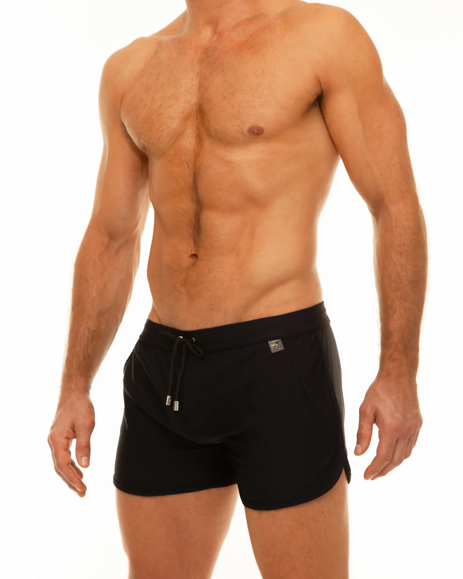 Black along slit swim short trunks with drawstring waistband and small metallic logo on the side
