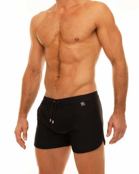 Black along slit swim short trunks with drawstring waistband and small metallic logo on the side