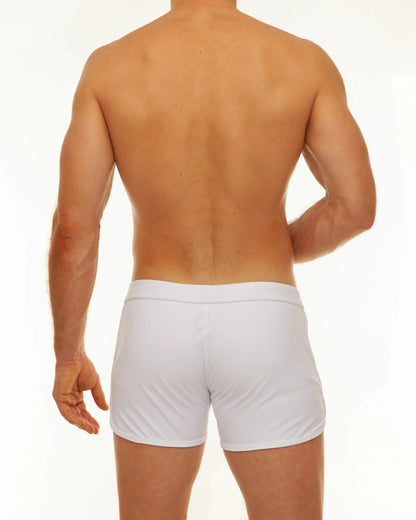 White athletic briefs with a smooth form fitting design featured in the along slit swim short collection