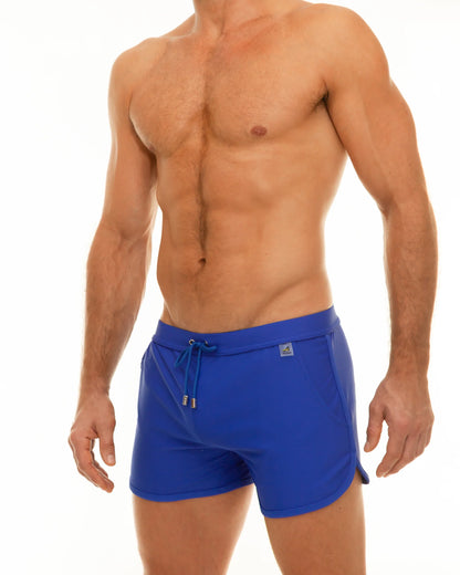 Bright blue along slit swim short with drawstring waistband and side pockets for comfortable beachwear