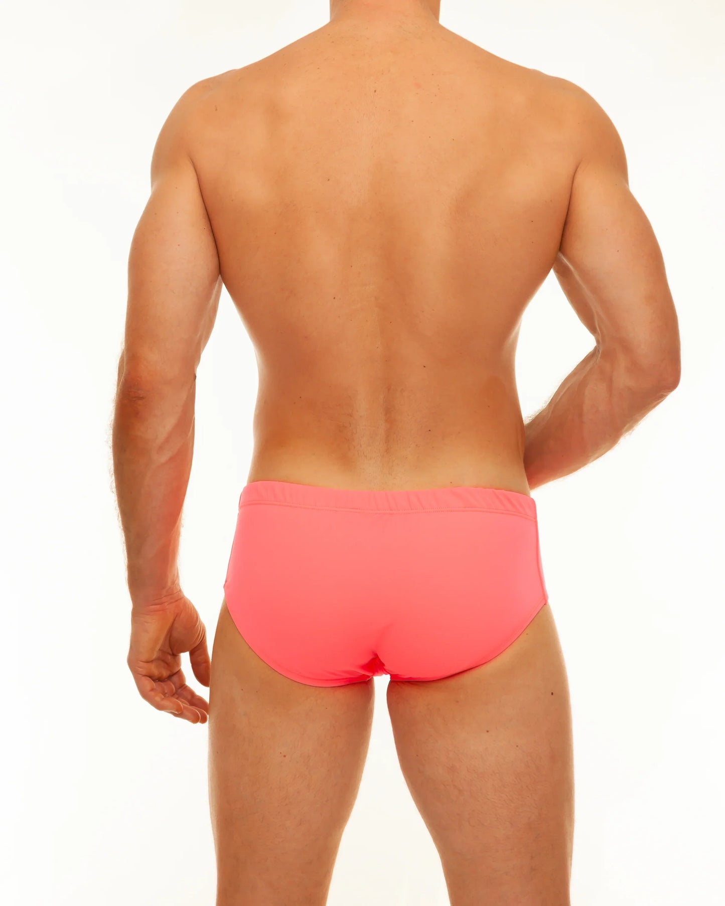 Bright pink along solid swim brief made from quick-dry material designed for comfortable swimwear use