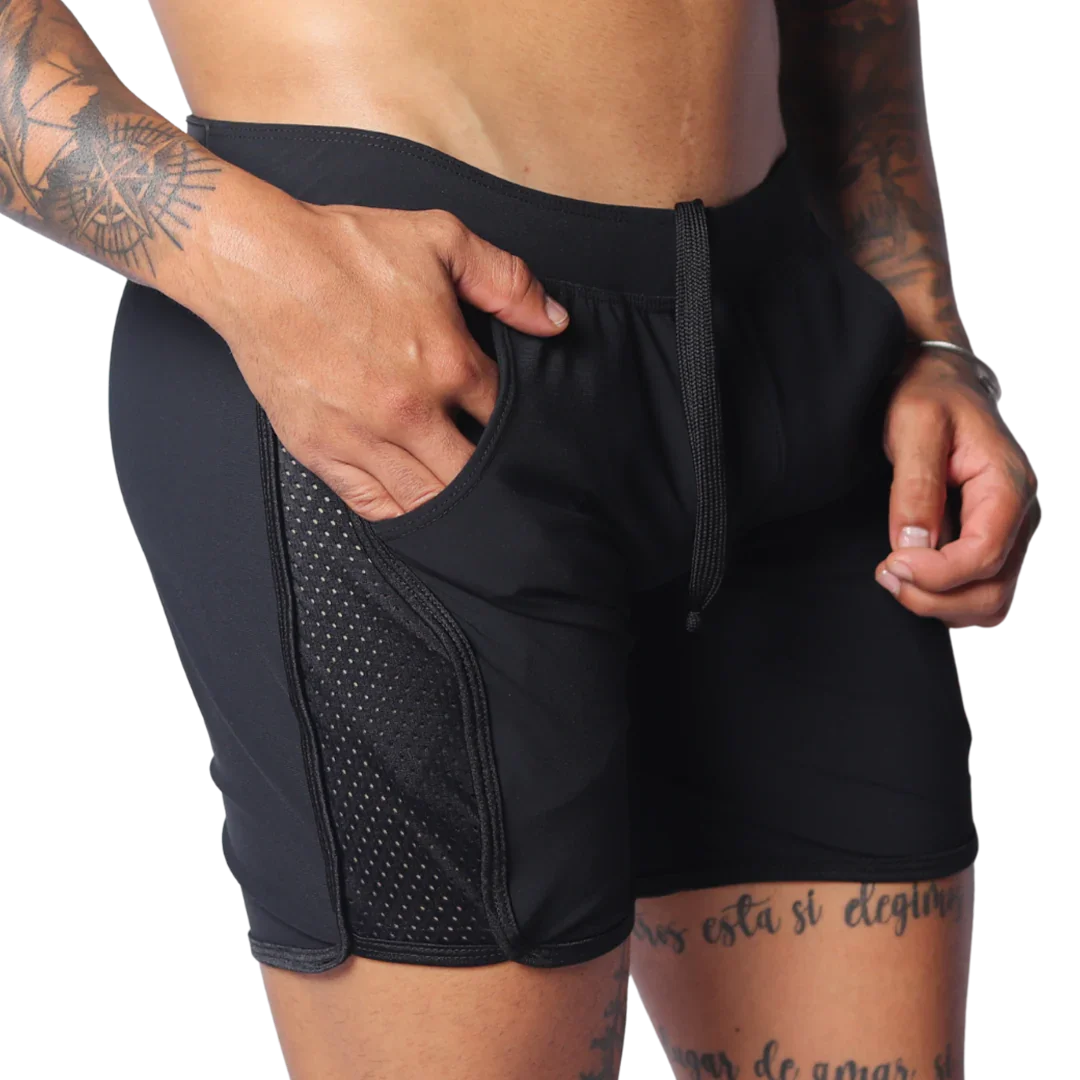 Black athletic shorts with a drawstring waistband, side mesh panel detailing, and deep side pockets.