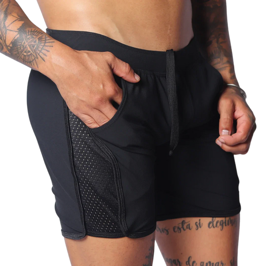 Black athletic shorts with a drawstring waistband, side mesh panel detailing, and deep side pockets.