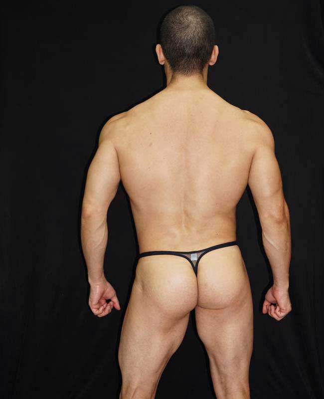 Black arroyman nylon bulge thong underwear size m showing back side with small silver rectangular tag on backband