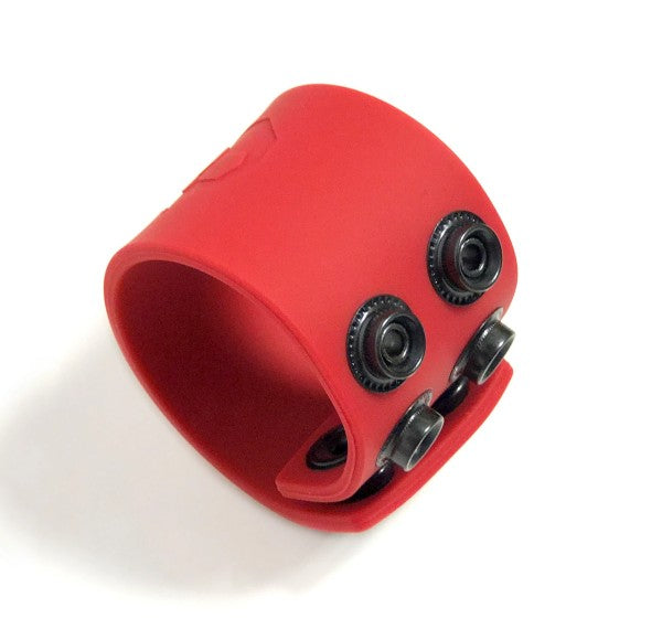 Red silicone ball strap wristband with black metal snap buttons designed for secure fit and durability