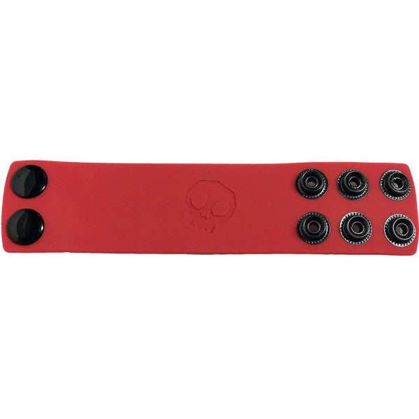 Red leather ball strap wristband with black snap buttons and debossed skull emblem