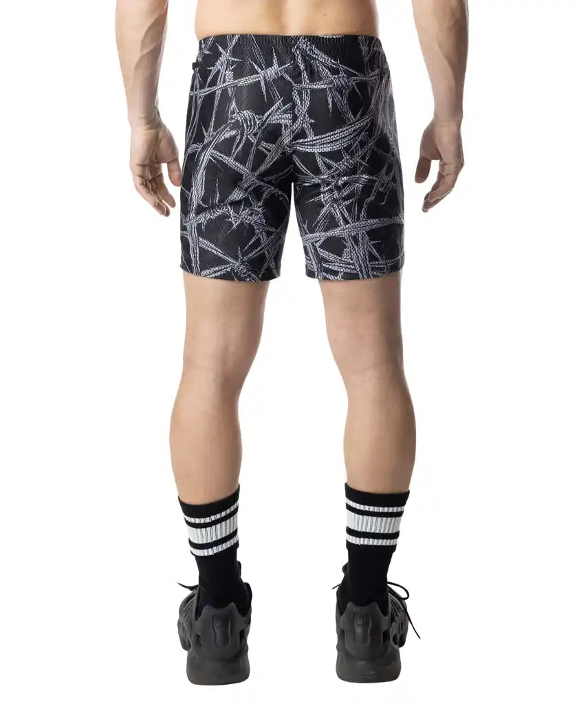 Black rugby shorts with white barbed wire pattern ideal for sports and casual wear