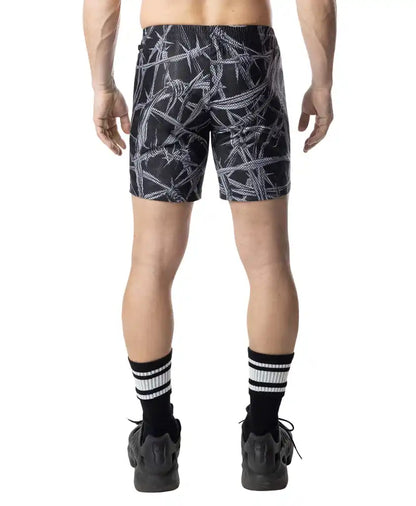 Black rugby shorts with white barbed wire pattern ideal for sports and casual wear