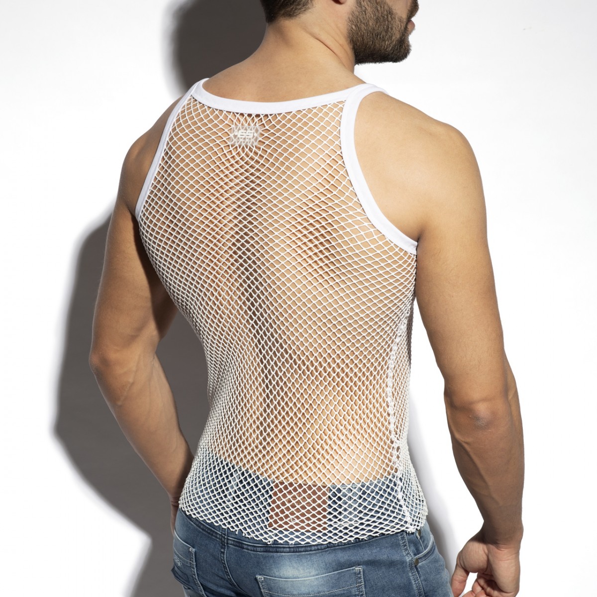 White mesh BEACHY NET strap tank top with white trim and small logo at the neckline suitable for casual wear