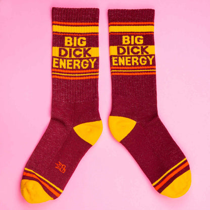 Maroon and yellow striped big dick energy crew socks made of textured knit material for bold style