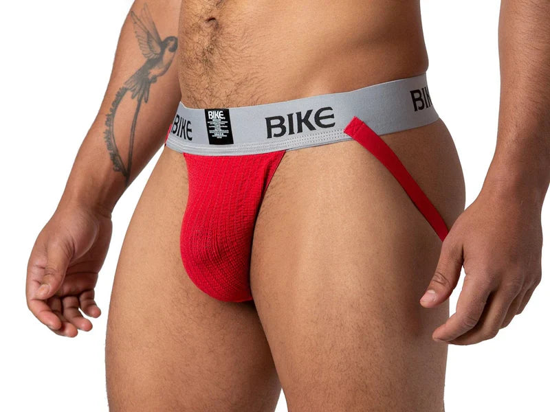 Red bike classic jockstrap featuring a gray waistband and black logo for athletic support and comfort