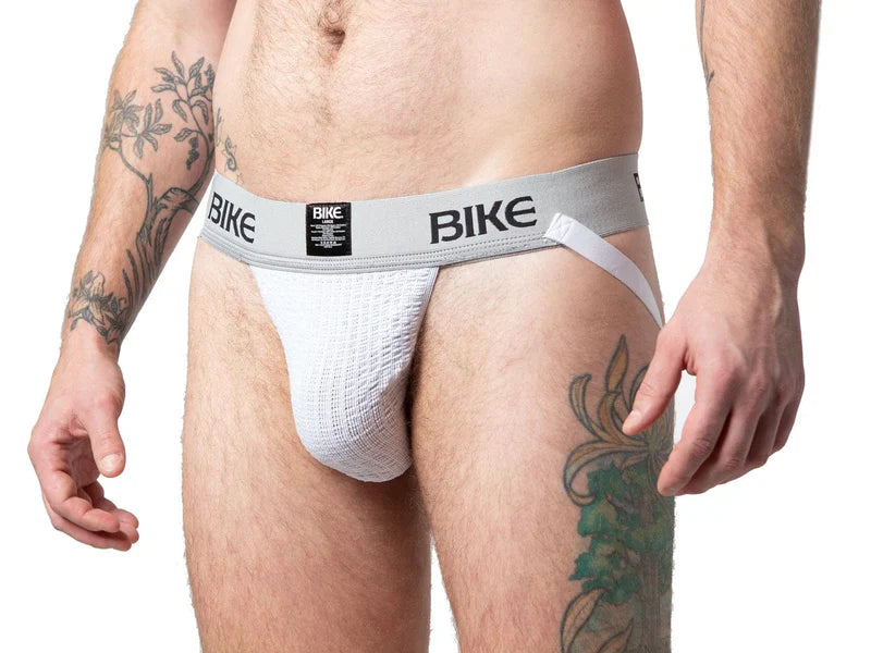 White textured athletic brief with gray bike branded waistband and black label from BIKE classic jockstrap collection