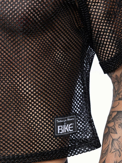 Black mesh short-sleeved bike practice jersey with subtle sheen and tailored for women branded label