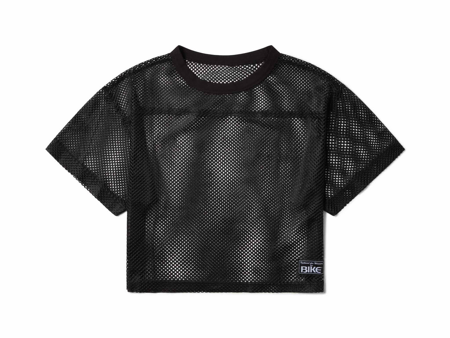 Black mesh crop top with round neckline short sleeves and small rectangular label on lower right side for bike practice jersey