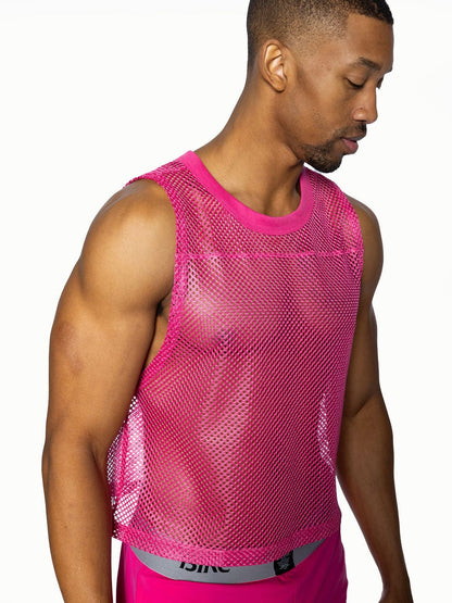 Bike sleeveless practice jersey in vibrant pink mesh with rounded neckline and elasticated hem for breathable comfort