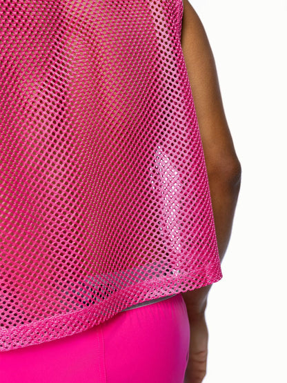 A vibrant pink bike sleeveless practice jersey with breathable mesh fabric and a slightly flared hem