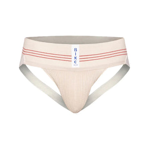 Vintage cream jockstrap with red stripes on the waistband and a vertical "BIKE" logo tag centered in front.