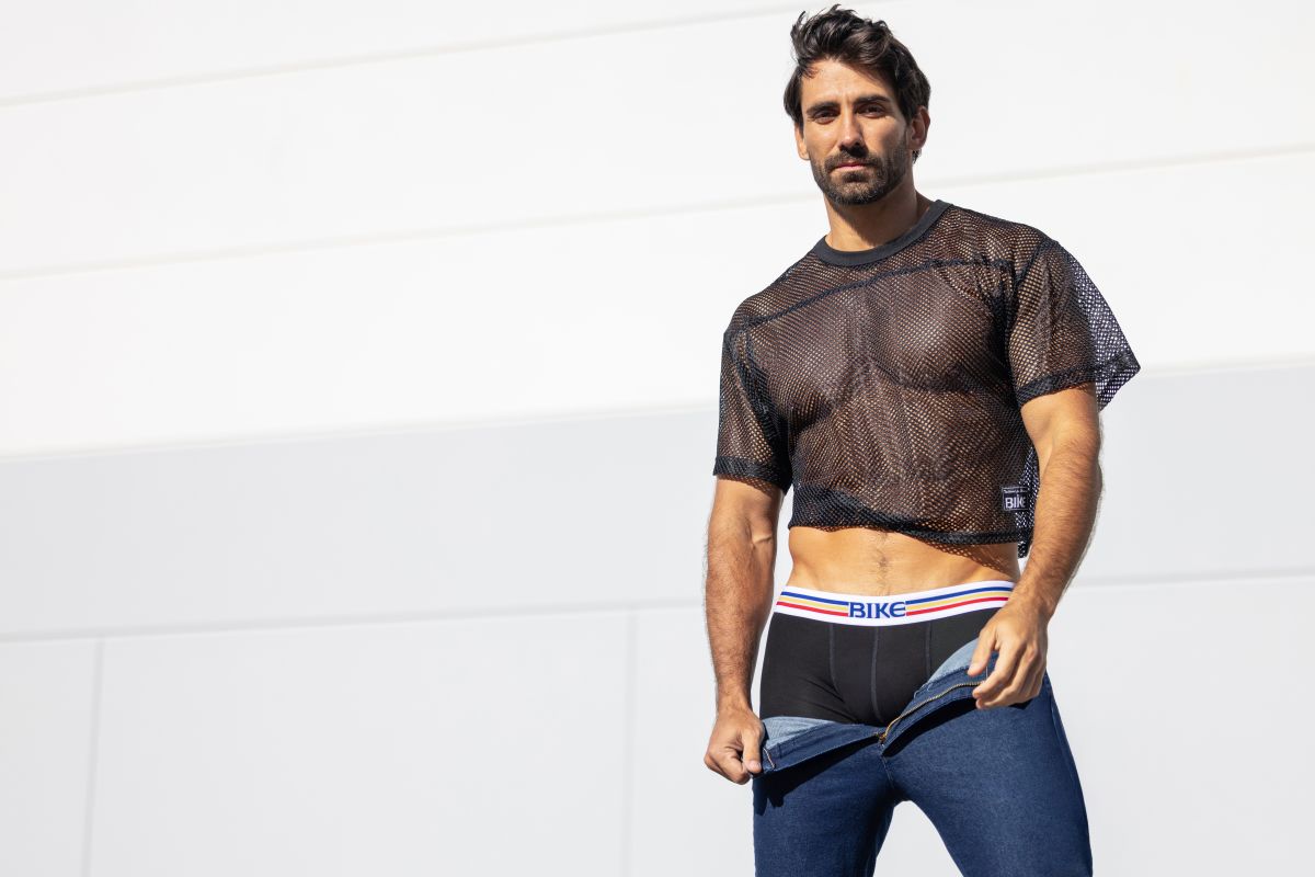Black mesh crop top with short sleeves and subtle logo on lower left side from bike athletic bam134 practice jersey