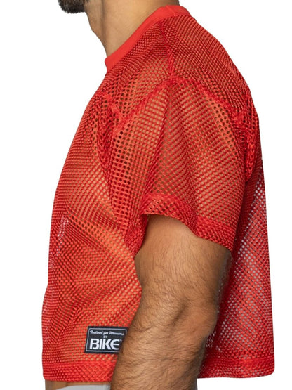 Bike athletic bam134 short sleeve bright red mesh practice jersey with ribbed collar hem and black label on lower left side