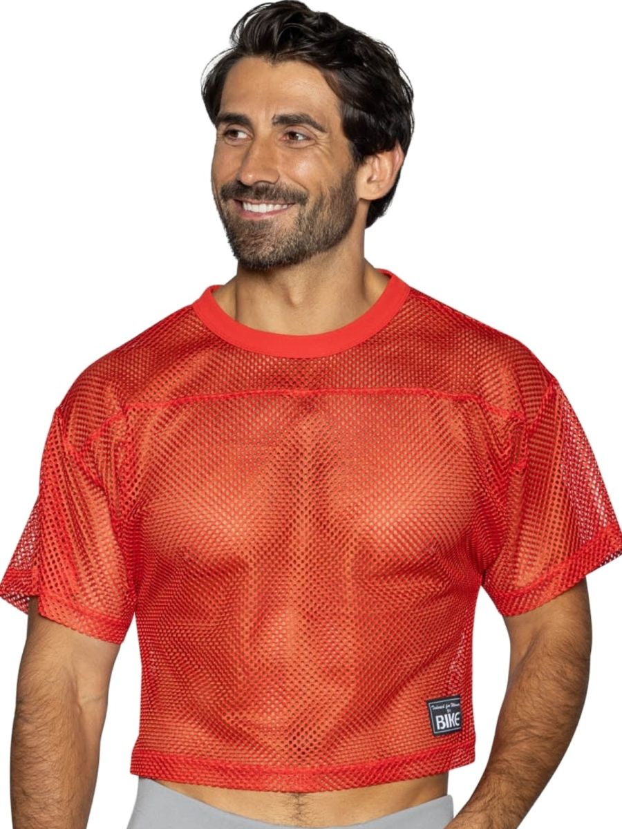 Red mesh crop top with ribbed crew neckline short sleeves and small black label in bright red bike athletic style