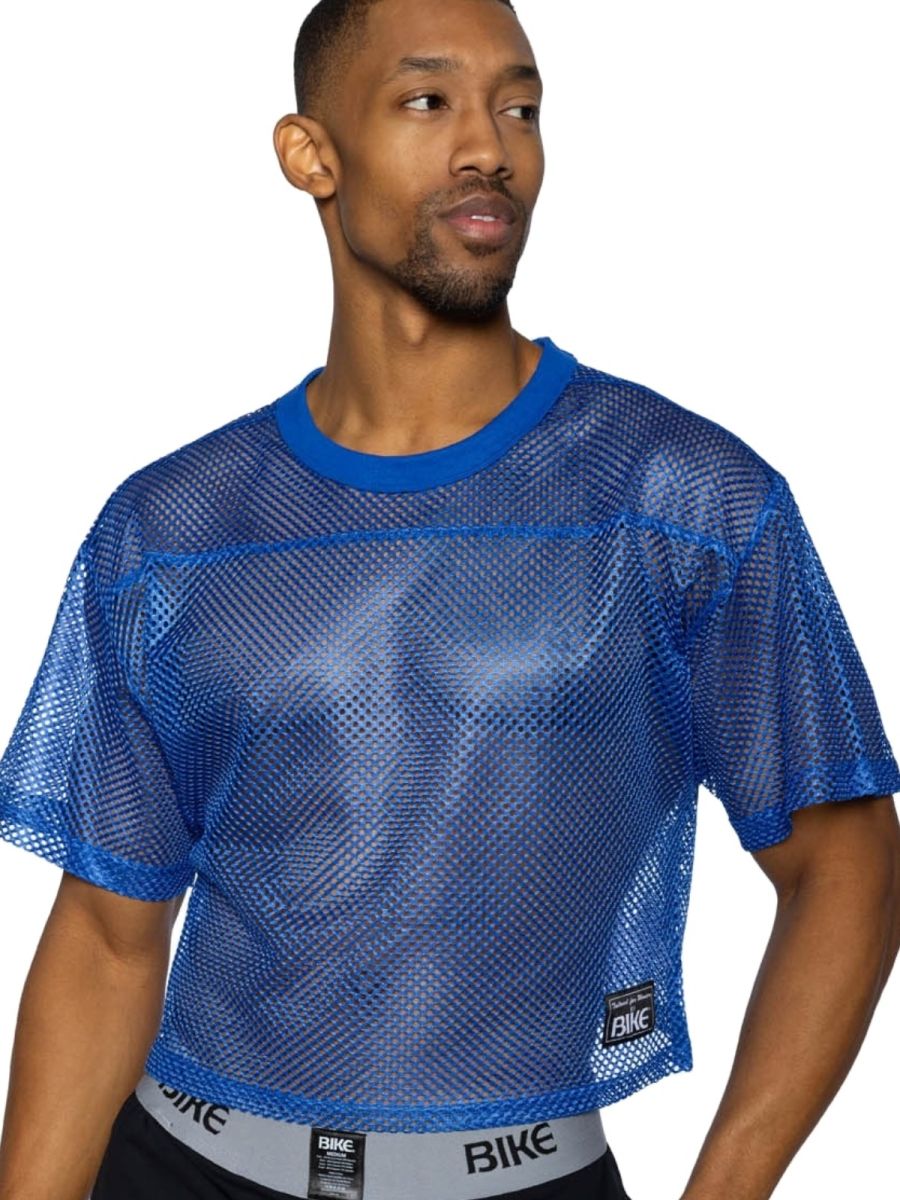 Blue mesh crop top with solid blue ribbed neckline and hem featuring bike logo in royal color for athletic use