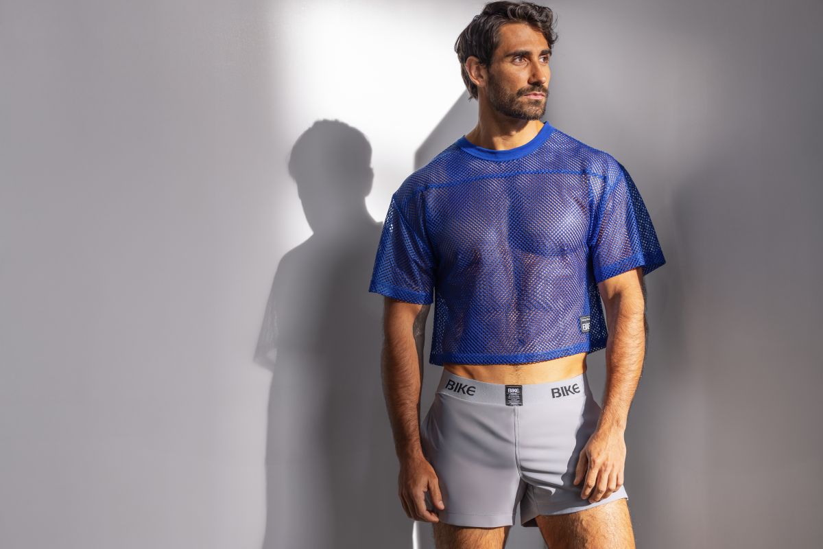 Blue mesh short sleeve crop top with round neckline from BIKE athletic BAM134 practice jersey in royal color