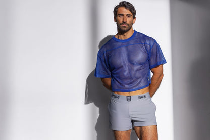 Blue mesh crop top with short sleeves made of breathable fabric for athletic use in royal color