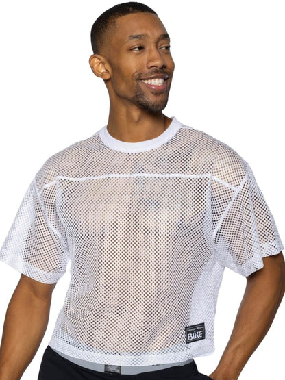 White mesh short sleeve athletic top with ribbed crew neckline and small black bike logo patch on lower left side