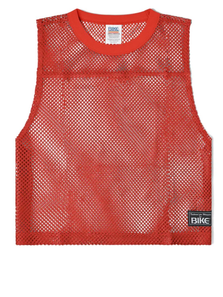 Red mesh sleeveless practice jersey with ribbed neckline and branded labels by BIKE Athletic in color red
