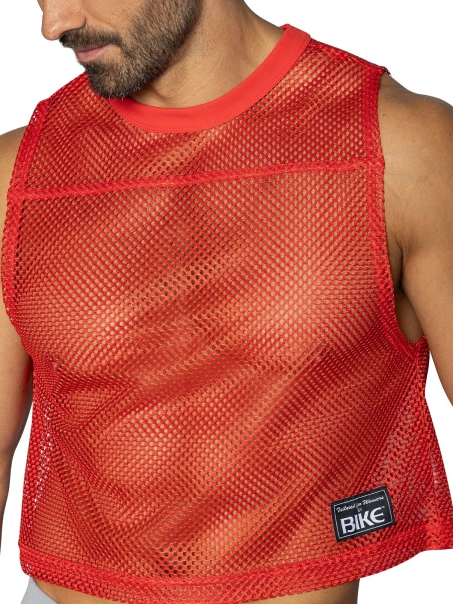 Red mesh sleeveless practice jersey with solid red ribbed neckline and hem by BIKE Athletic BAM135
