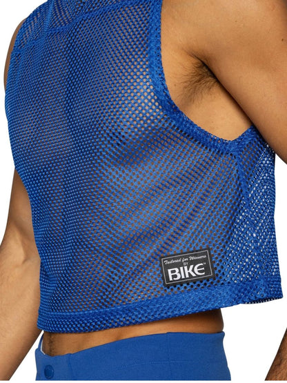 Back view of blue mesh crop top with black bike brand patch on lower back sleeveless practice jersey royal blue