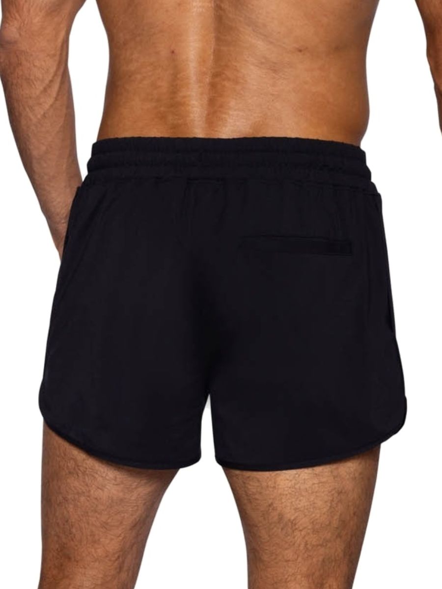 Black bike athletic bam200 track shorts with elastic waistband and single back pocket shown from the back side