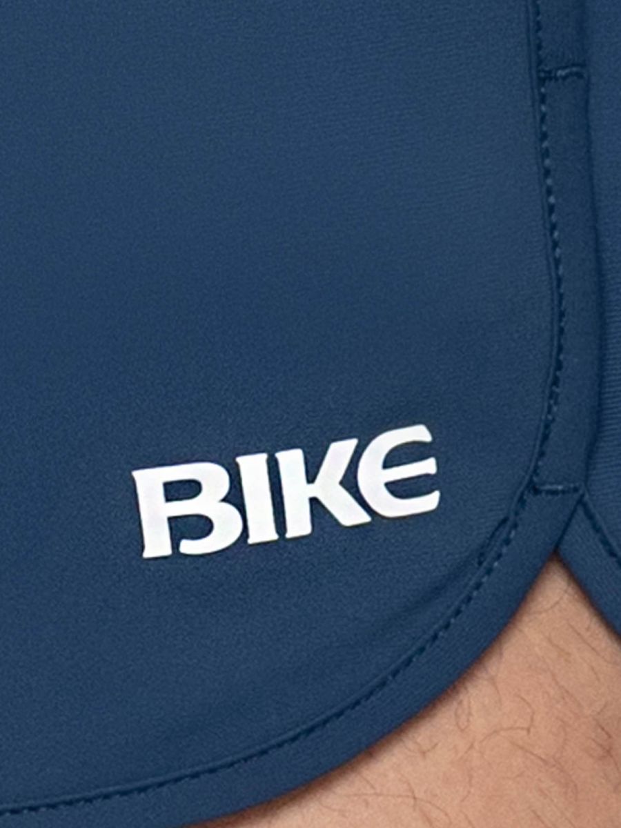 Navy bike athletic bam200 track shorts with white bike logo embroidered on the side for sports and training