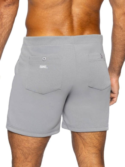Gray bike athletic bam207 coaches shorts with sleek design and two front pockets with button closures