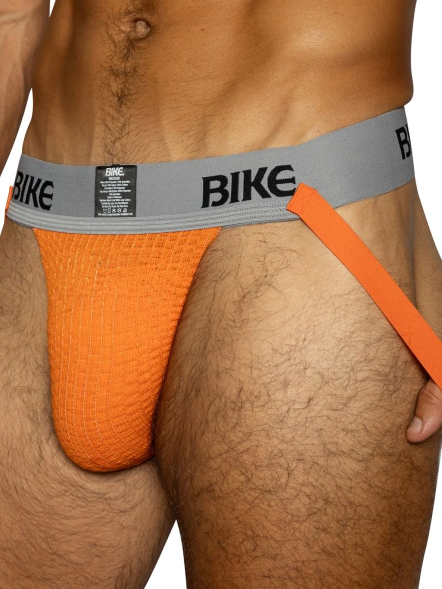 Orange BIKE men's athletic jockstrap with a textured pouch and grey waistband.