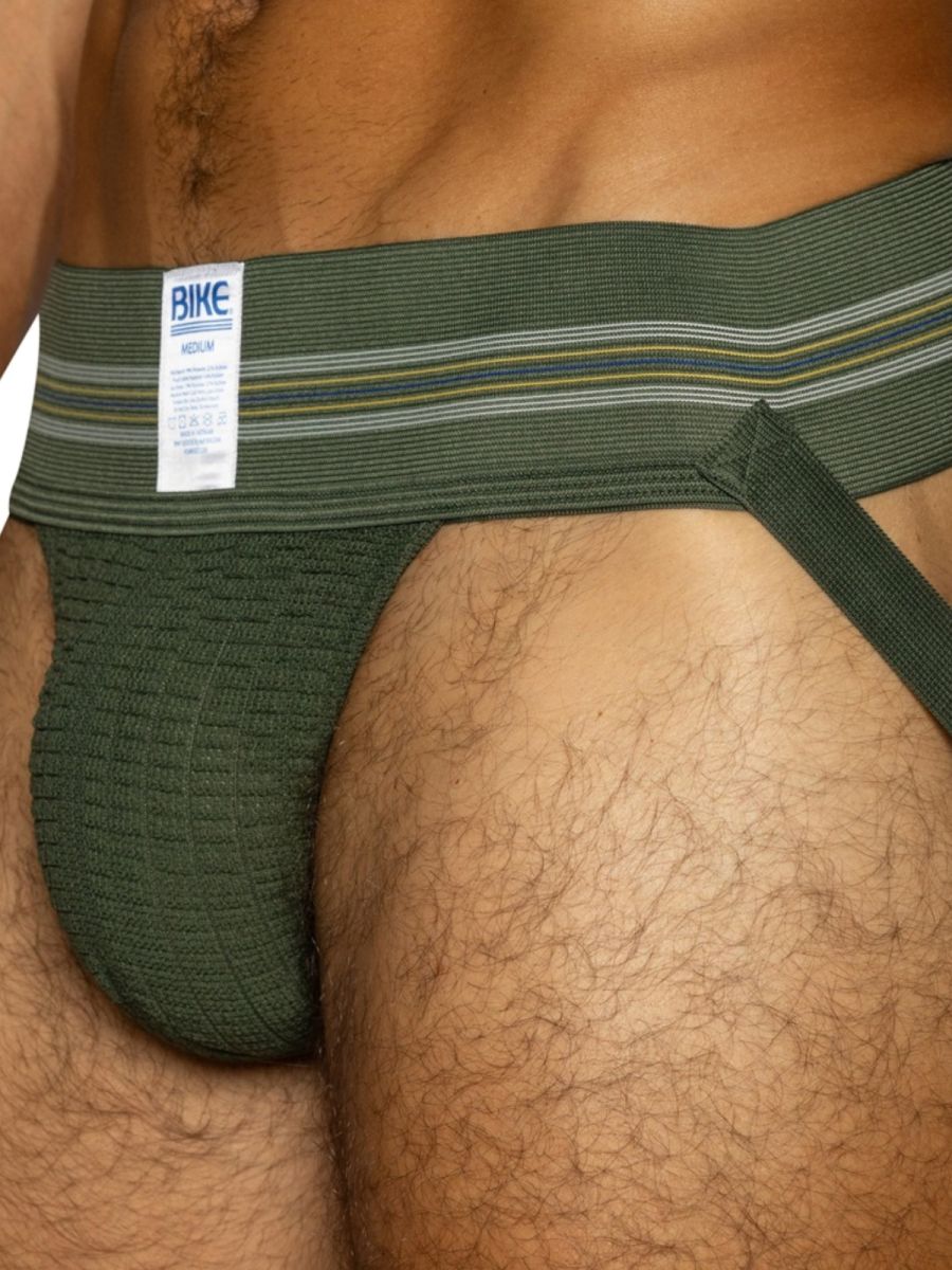 BIKE olive green men's jockstrap underwear with textured pouch and striped waistband.