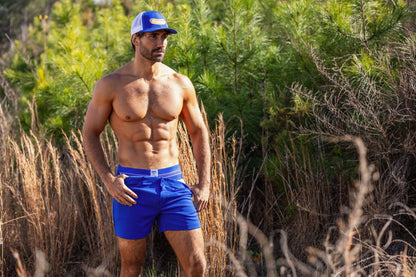 Blue athletic shorts with matching waistband and small white logo on left side from bike athletic bas306 jockstrap royal