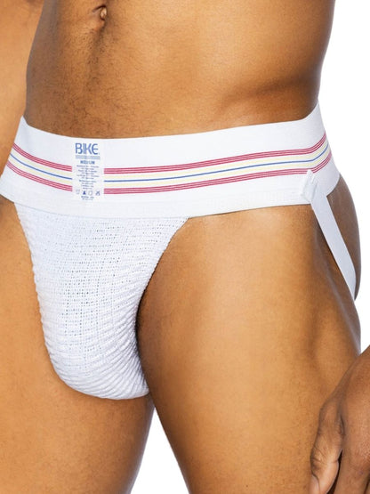 White bike athletic briefs with red and blue striped waistband made of textured knit fabric original number 10 jockstrap