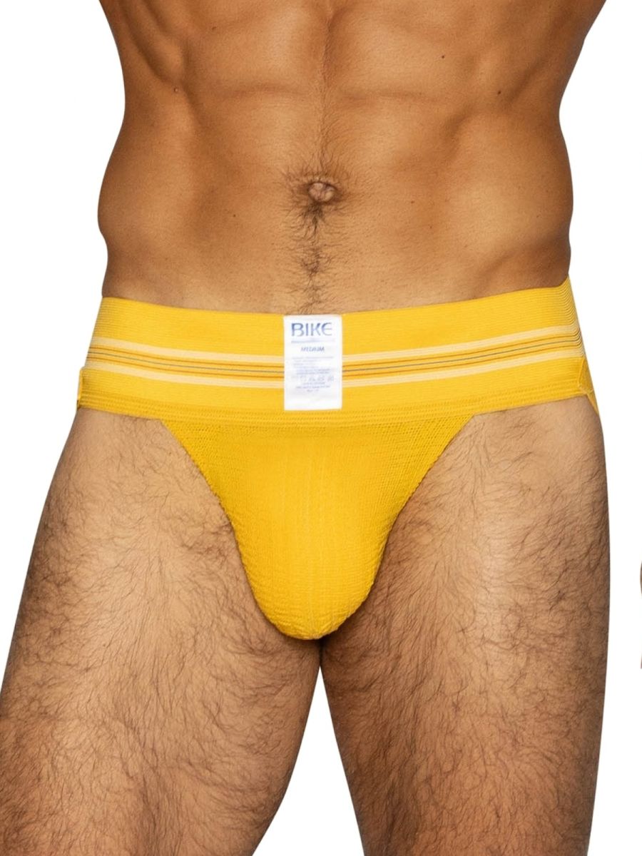 Bright yellow bike athletic briefs with white stripes and brand label designed for sports and active wear
