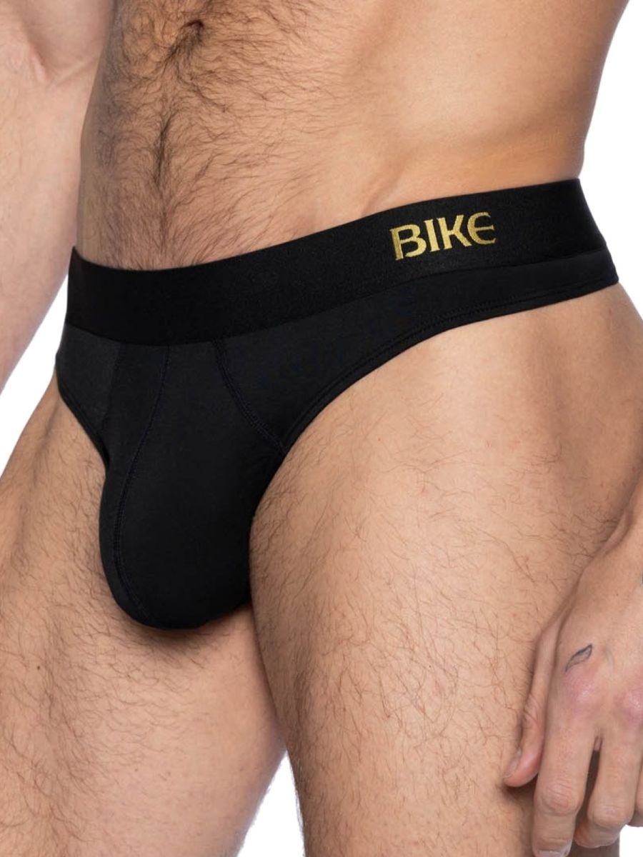 Black men’s bike briefs with gold bike branding on waistband shown from the back in athletic BAS319 active thong style