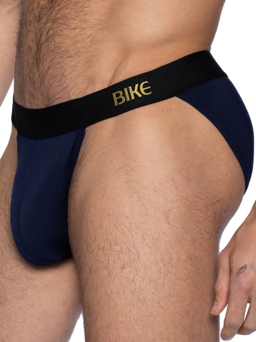 Navy bike athletic BAS331 active jock brief with black waistband and gold lettering shown from the back side