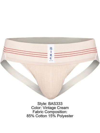 Vintage cream bike athletic briefs with ribbed texture and red-striped waistband in classic 1980s jockstrap style