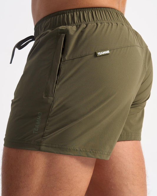 Olive green bolt 3 inch teamma athletic shorts with drawstring waistband and side pockets for active wear