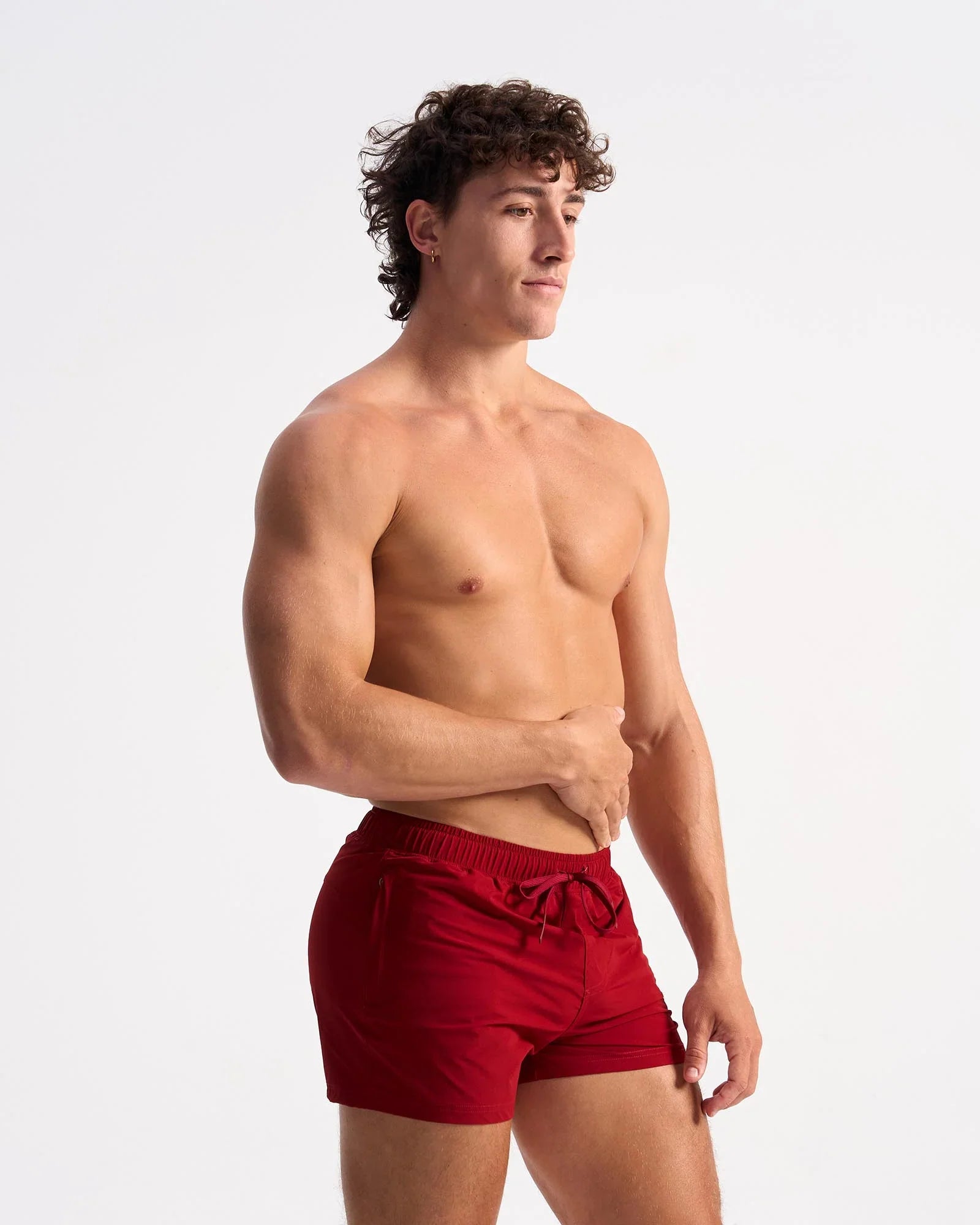 Red bolt 3 inch athletic shorts with a drawstring waistband designed for comfort and performance