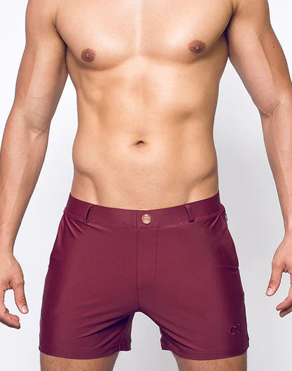 Maroon bondi short swim trunks with a sleek form-fitting design and subtle brand logo on the lower right leg