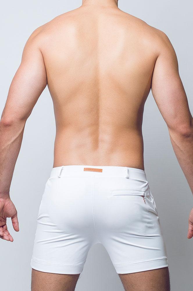 White Bondi short athletic shorts with subtle texture and small brown leather patch at the waistband